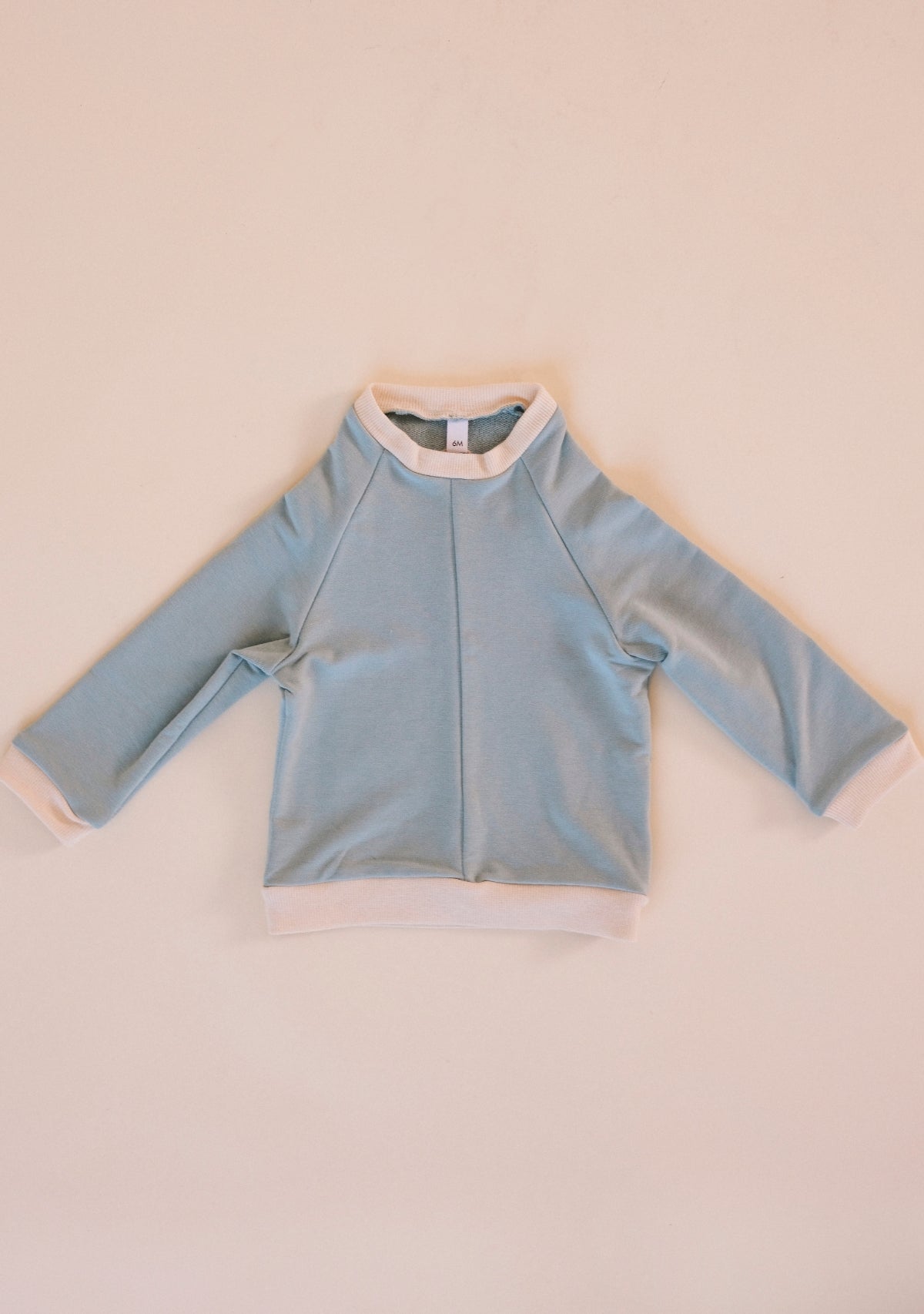 the ultra-soft baby Organic Cotton + Tencel Fleece sweatshirt