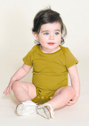 organic cotton baby onesies made in America / hypoallergenic baby onesies. gentle on baby's skin. Golden color baby onesies.